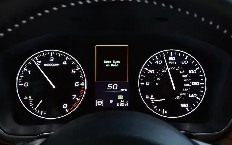 A close-up of a warning message from DriverFocus Distraction Mitigation System available on the 2022 Subaru Legacy.